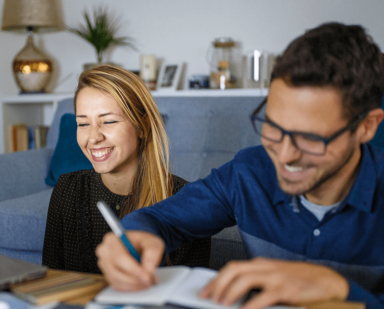 couple paying a bill together