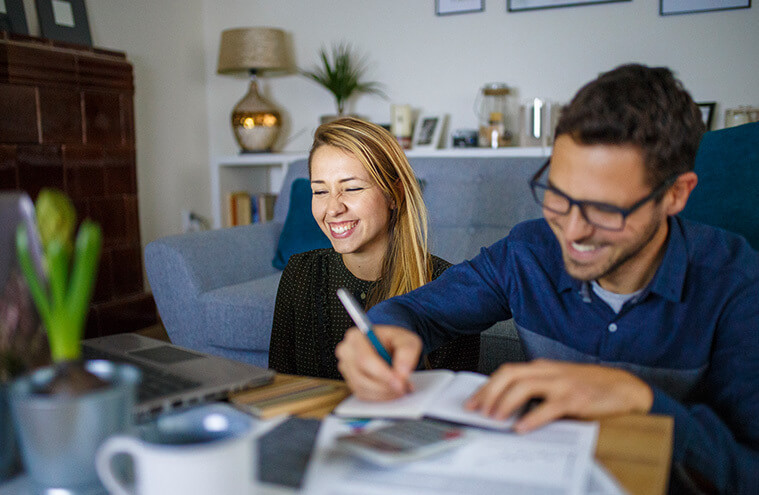 couple looking over forms together