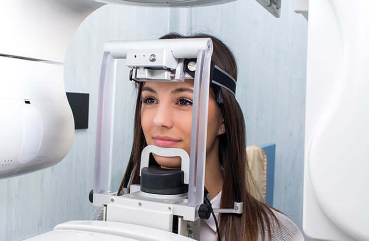 woman undergoing a CT scan