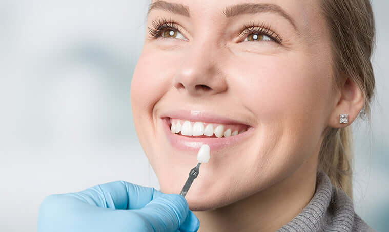 woman getting fitted for veneers